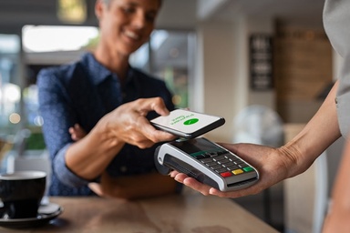 Contactless payment from a smartwatch at the bar